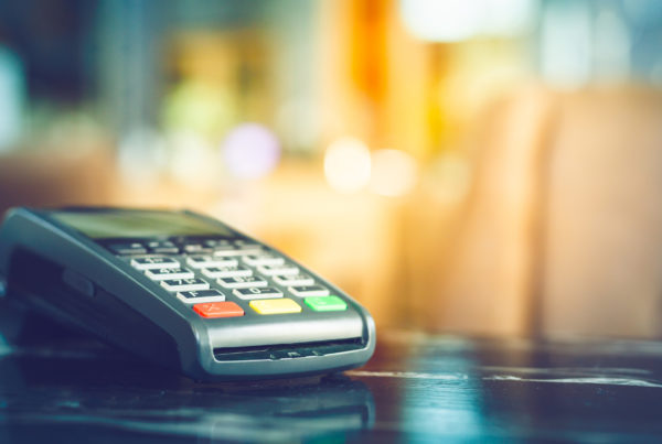 Close up of POS machine on c store counter.