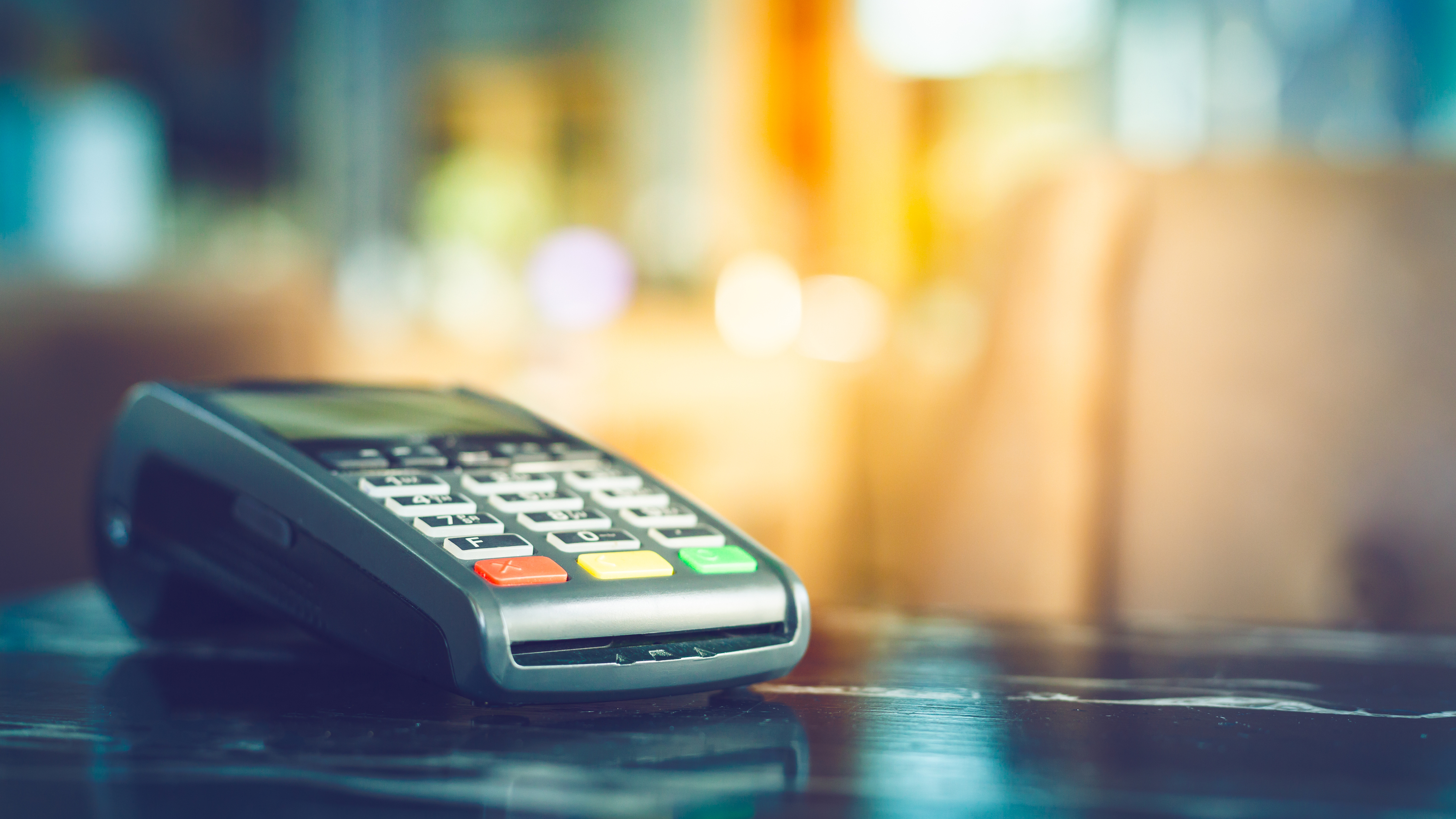 Close up of POS machine on c store counter.